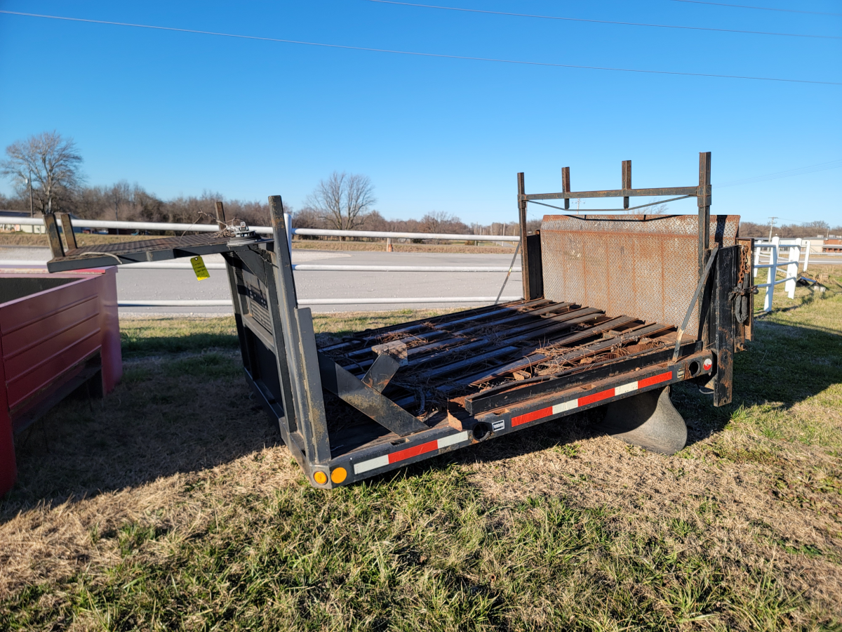 Flatbed with Tommy Gate and Front Rack Photo 0